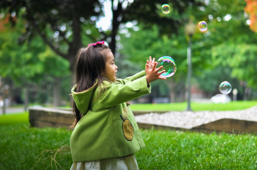 Girl playing outdoors